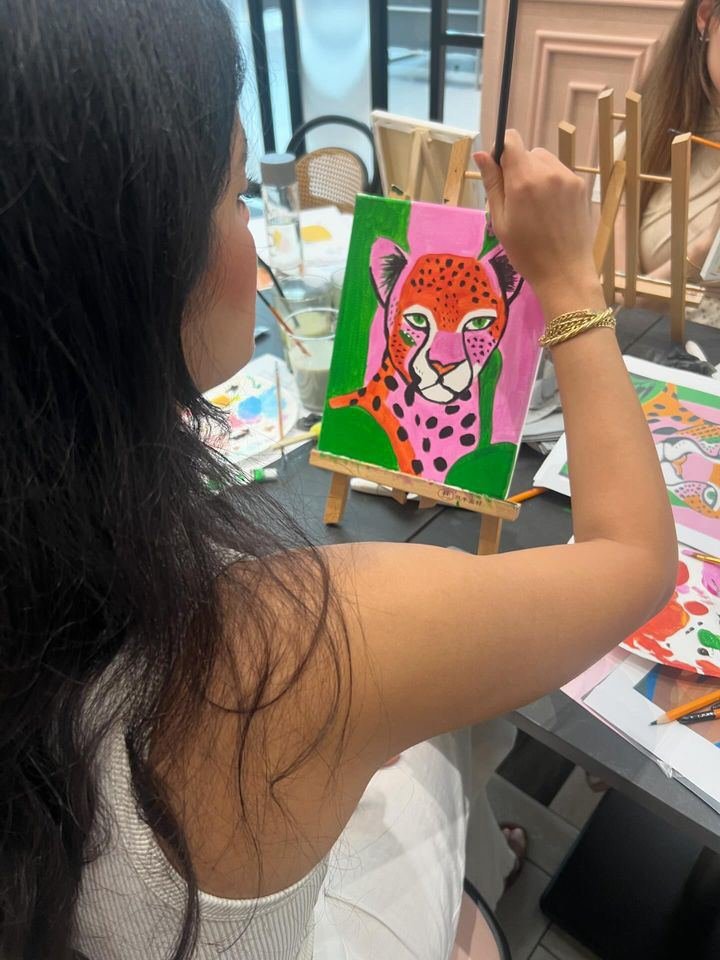 A bright cheetah painting in progress