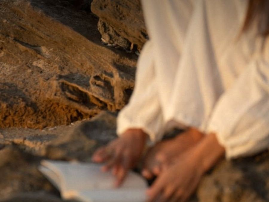 Hands on an open guided journal